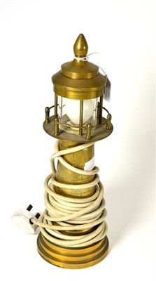 Lot 392 - # A bronze table lamp in the form of a light house, 38cm high