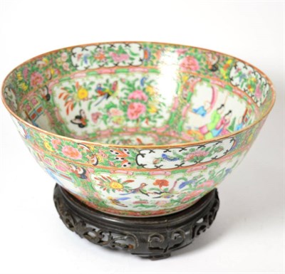 Lot 394 - A 19th century Cantonese porcelain bowl, typically painted with figures and flowers, 29cm diameter