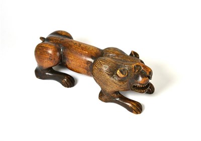 Lot 398 - A carved figure of a crouching tiger, 28cm long