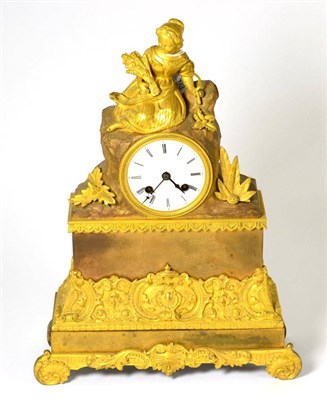 Lot 413 - A gilt metal striking mantel clock, circa 1840, surmounted by a harvest lady, enamel dial with...