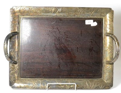 Lot 417 - A Japanese silver and mahogany twin handled tray, 54cm wide