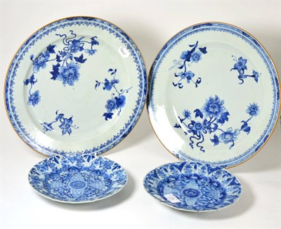 Lot 427 - A pair of 18th century Chinese porcelain dishes painted in underglaze blue with foliage, 35cm...