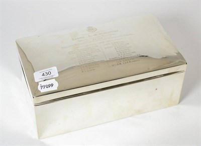 Lot 430 - A large silver cigarette box, Birmingham assay, the rounded rectangular lid with presentation...