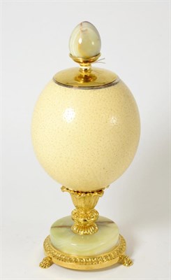 Lot 437 - Anthony Redmile, mounted ostrich egg with alabaster base, 31cm high