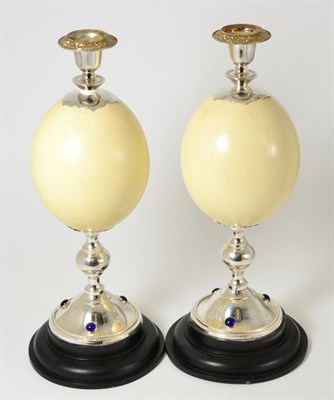 Lot 438 - Anthony Redmile, pair of ostrich egg candlesticks, 37cm high