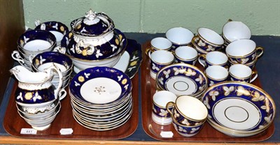 Lot 441 - A 19th century blue ground tea set decorated with flowers, together with a 19th century blue ground