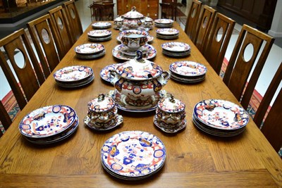 Lot 472 - An Ashworth Real Ironstone China Imari dinner service comprising two soup tureens, covers and...