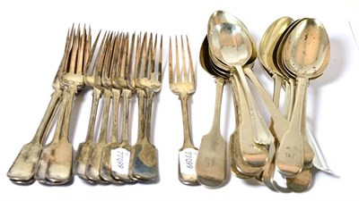 Lot 485 - A collection of silver flatware comprising twelve fiddle pattern table forks, ten assorted...