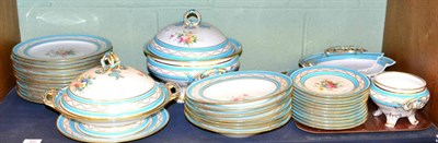 Lot 505 - A Minton dinner service, blue bordered with floral sprays