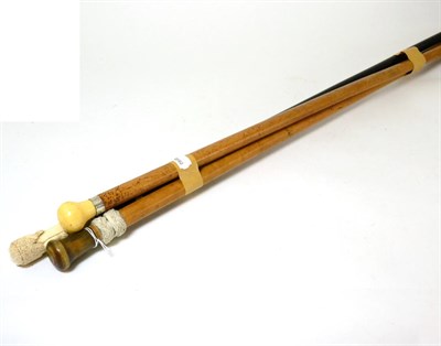 Lot 510 - A late Victorian ivory handled walking cane, two malacca walking canes onw with an ivory pommel and