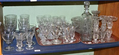 Lot 515 - Two shelves of 19th century and later glass ware, including rummers, wine glasses, decanter,...