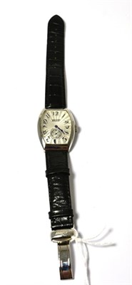 Lot 527 - A tonneau shaped limited edition stainless steel wristwatch, signed Tissot, 0320/6666 limited...