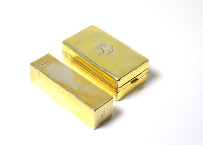 Lot 531 - Drews & Co London, silver gilt rectangular box and cover and a travel lighter (2)