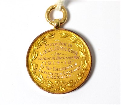 Lot 549 - A George V 9ct gold medallion presented to Lieut. J D Milburn for Valour in the Great War 1914-1918