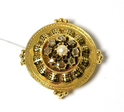 Lot 551 - A Victorian enamel, diamond and pearl set brooch, measures 4cm in diameter