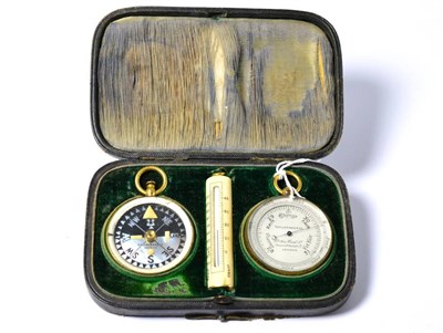 Lot 563 - A Compendium cased aneroid barometer/compass/thermometer, retailed by Callaghan & Co, New Bond...