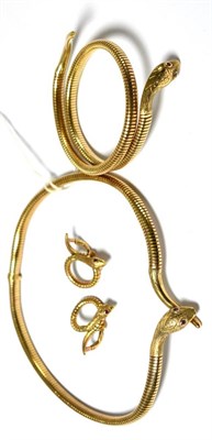 Lot 583 - A 9ct gold snake necklace with ruby set eyes together with a bracelet and a pair of earrings en...