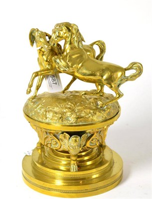 Lot 587 - # A mid-19th century Continental bronze inkwell, the cover cast with wild horses, removing to...