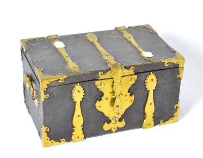 Lot 588 - A 19th century Colonial padouk wood lined leather and brass bound casket, 31cm diameter