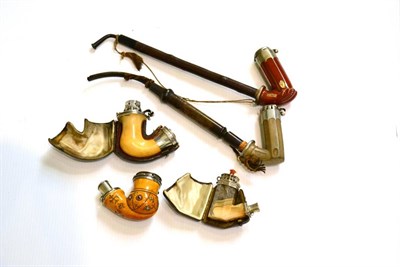 Lot 598 - An agate pipe, a meerschaum pipe set with semi precious stone, a Viennese meerschaum pipe with...