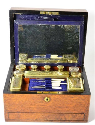 Lot 607 - A Victorian walnut toilet box, fully fitted with glass jars and plated mounts