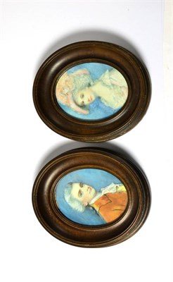 Lot 620 - A pair of early 20th century oval portrait miniatures on ivory, reputedly depicting Sir Charles and