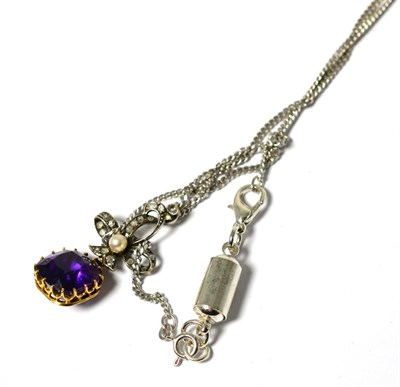 Lot 640 - An amethyst, pearl and diamond pendant, with a rose cut diamond bow motif, set with a pearl...