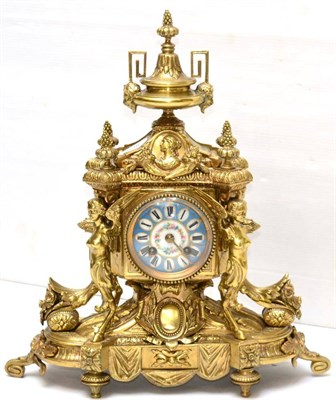 Lot 655 - An ormolu striking mantel clock, circa 1890, the elaborate case with floral and figural mounts,...