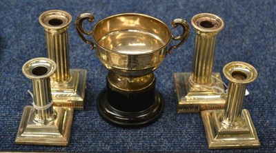 Lot 667 - A silver twin handled trophy cup engraved horse section, a pair of silver Corinthian column...