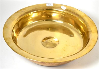 Lot 670 - A large 19th century brass bowl, 45cm diameter