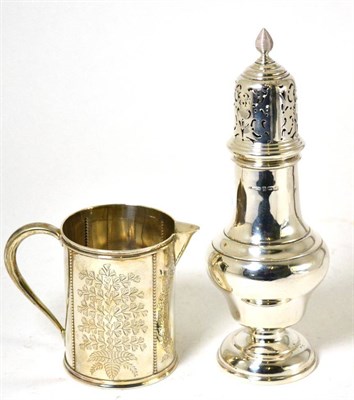 Lot 673 - A silver castor, Birmingham 1930, together with an engraved silver jug, London 1874