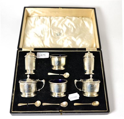 Lot 675 - A cased silver condiment set stamped Biddle & Dunthorn Lord St, Liverpool