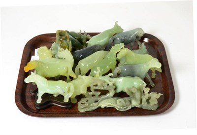 Lot 689 - A collection of assorted jadeite and hardstone carved animals and groups; together with a...