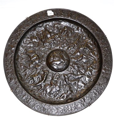 Lot 697 - A 19th century circular bronze plaque, relief decorated with classical figures, diameter 66cm...