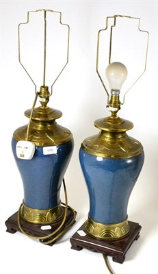 Lot 698 - A pair of blue cloisonne lamps with brass mounts, 40cm high