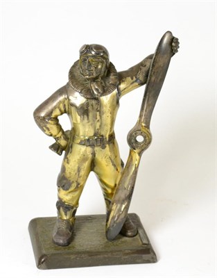 Lot 699 - A spelter aviator table lighter, 28cm high