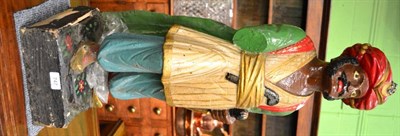 Lot 747 - A late 19th/early 20th century polychrome painted wooden figure of an Eastern gentleman 82cm...