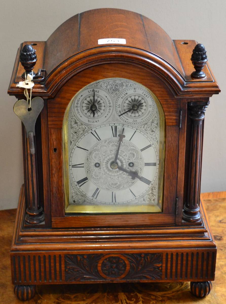 Lot 753 - An oak striking table clock, circa 1890,