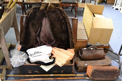 Lot 764 - + Three leather Gladstone bags, leather trunk with a quantity of clothing, a small leather...