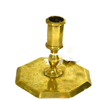 Lot 789 - A brass dwarf candlestick, probably Spanish, late 17th century, of octagonal form with baluster...