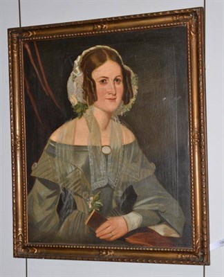 Lot 1061 - Follower of Margaret Carpenter (19th century) Portrait of a lady, half length, wearing a teal...