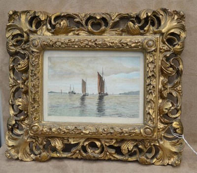 Lot 1115 - Attributed to William Lionel Wyllie RA, RBA, RI, RE, NEAC (1851-1931) Sailing barge and boats on an