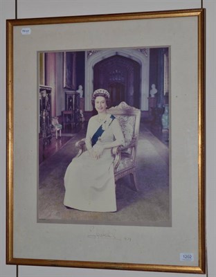 Lot 1202 - ~ Colour photograph of Queen Elizabeth, signed and dated 1979