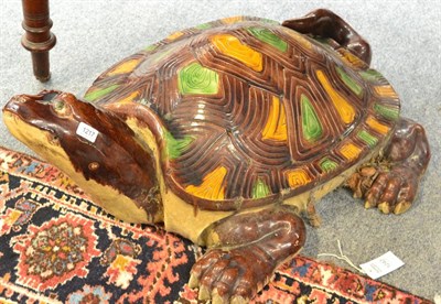 Lot 1217 - A large brown glazed ornamental turtle