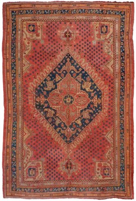 Lot 1230 - Ushak carpet, West/Central Anatolia, the soft raspberry field of stylised flowerheads around an...