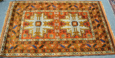 Lot 1248 - Lesghi Caucasian design rug, Afghanistan, the rust field with two Lesqhi stars enclosed by leaf and