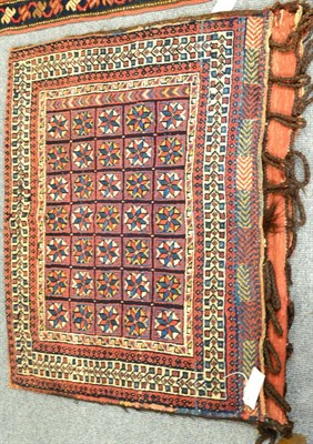 Lot 1257 - A good Afshar bagface, circa 1890, South East Persia, the indigo compartmentalised field of stellar