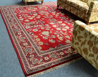 Lot 1264 - *An Indian carpet of late 16th century Moghul design, The raspberry field with a one way design...