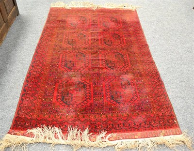 Lot 1277 - Turkmen rug, North Afghanistan, the compartmentalised field of elephant foot guls enclosed by...