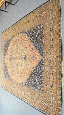 Lot 1278 - Tabriz carpet, Persian Azerbaijan, the pale apricot stepped lozenge field of angular stylised...